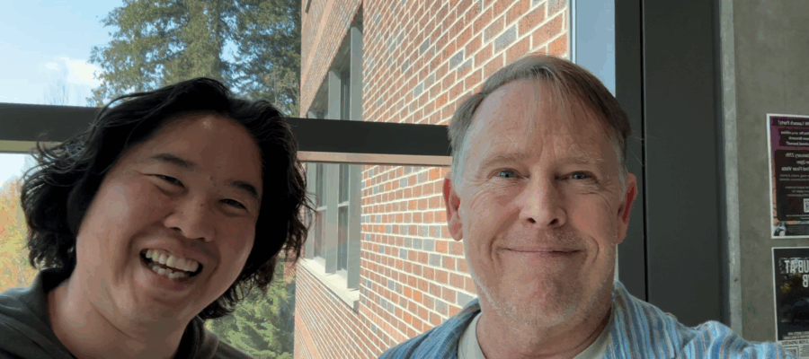 Todd and Ko smiling at the camera.